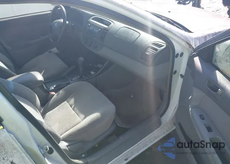 2002 Toyota Camry Le z USA, uszkodzony, nr VIN JTDBE32K620087402